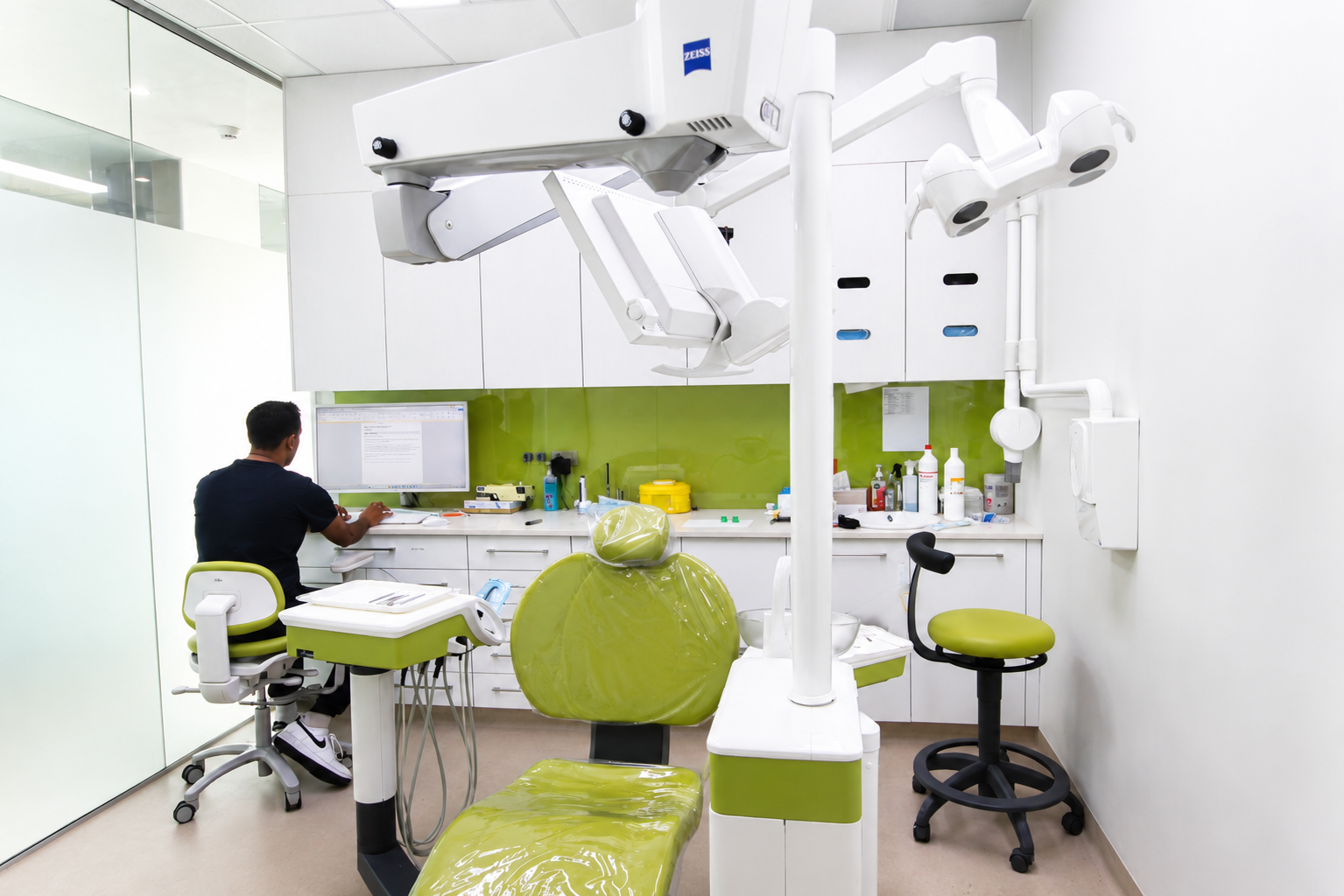 Specialist endodontist Dr Deepak Chellappa with a patient at Southwest Endodontic Centre